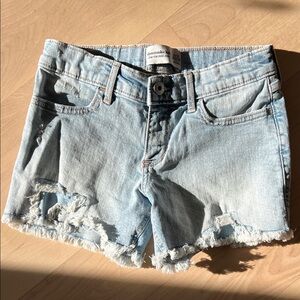 Abercrombie Kids Distressed, Ripped Light Blue Jean Shorts. Low rise midi fit.
